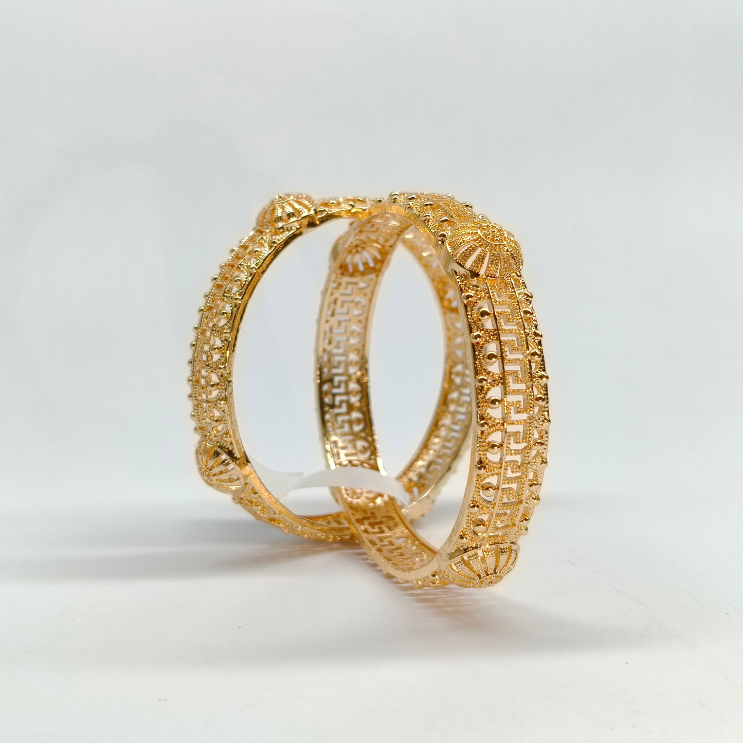 Ornate Gold-Tone Filigree Statement Bangles